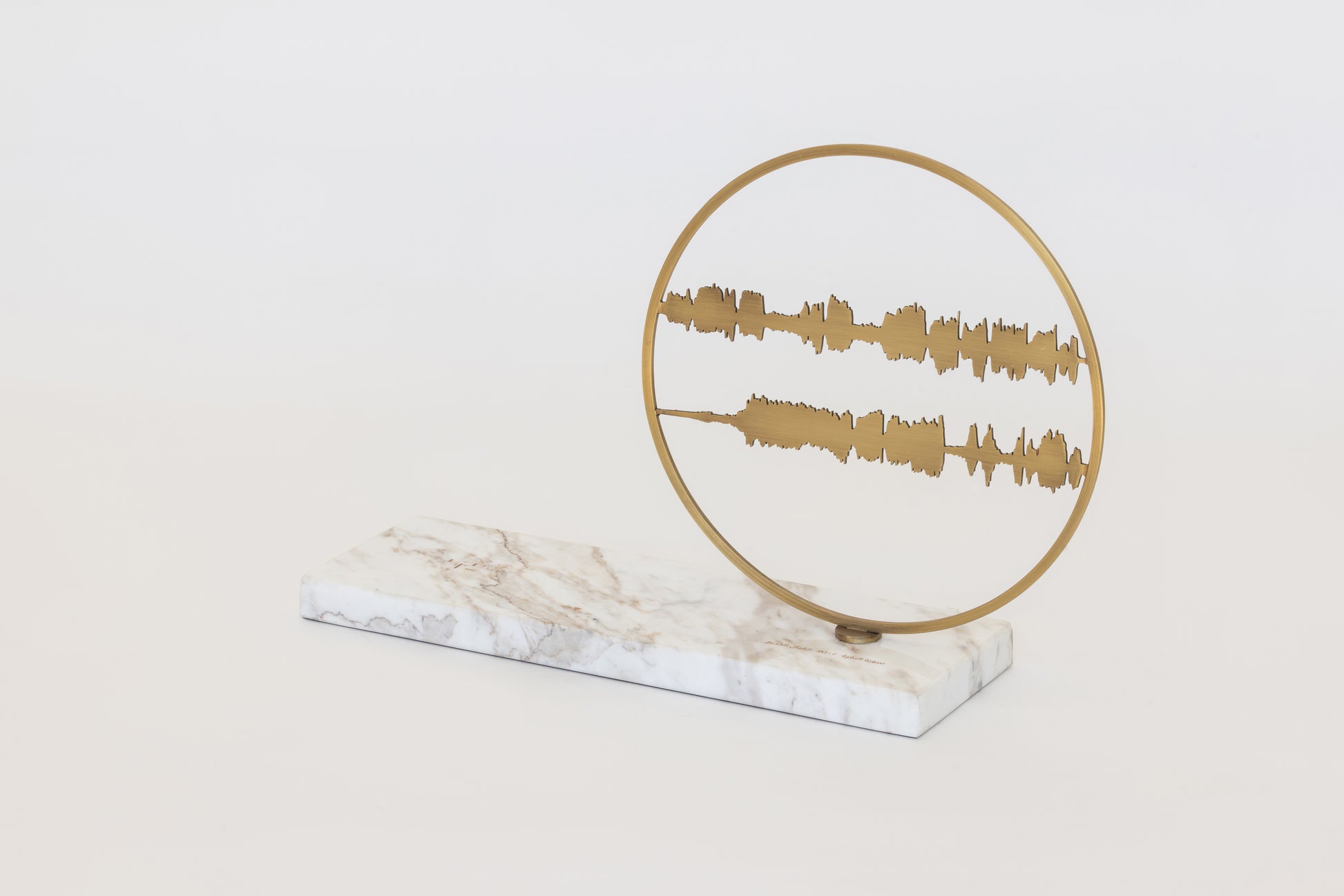 quraan sound waves artwork on marble