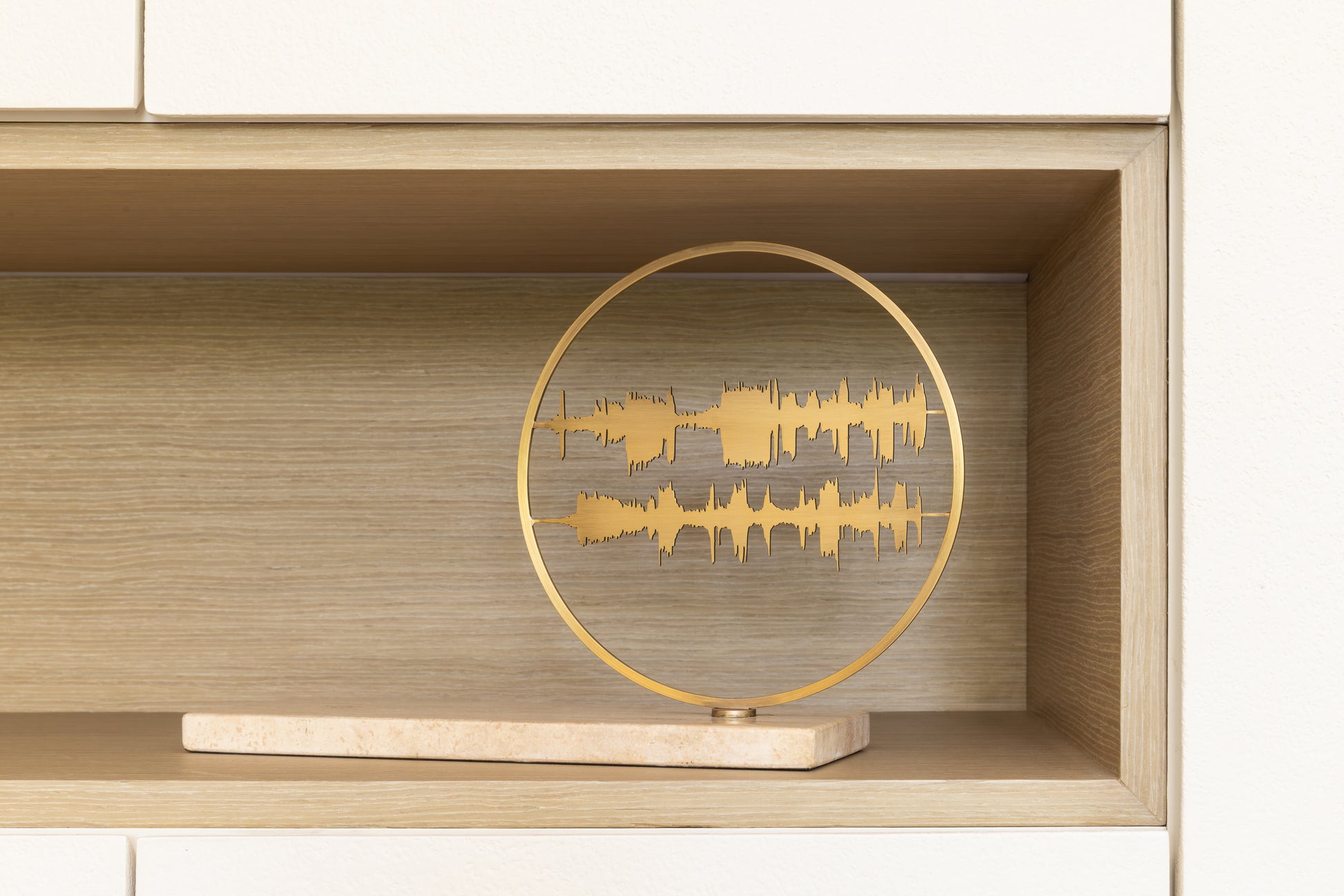 shelf decor accents in marble and steel and brass