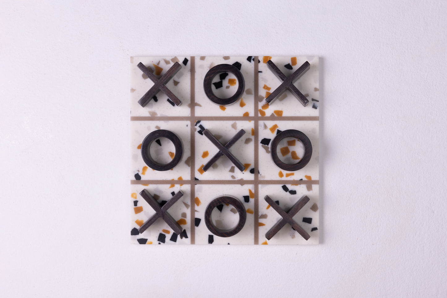 Board game decorative accent made from terrazzo and wood