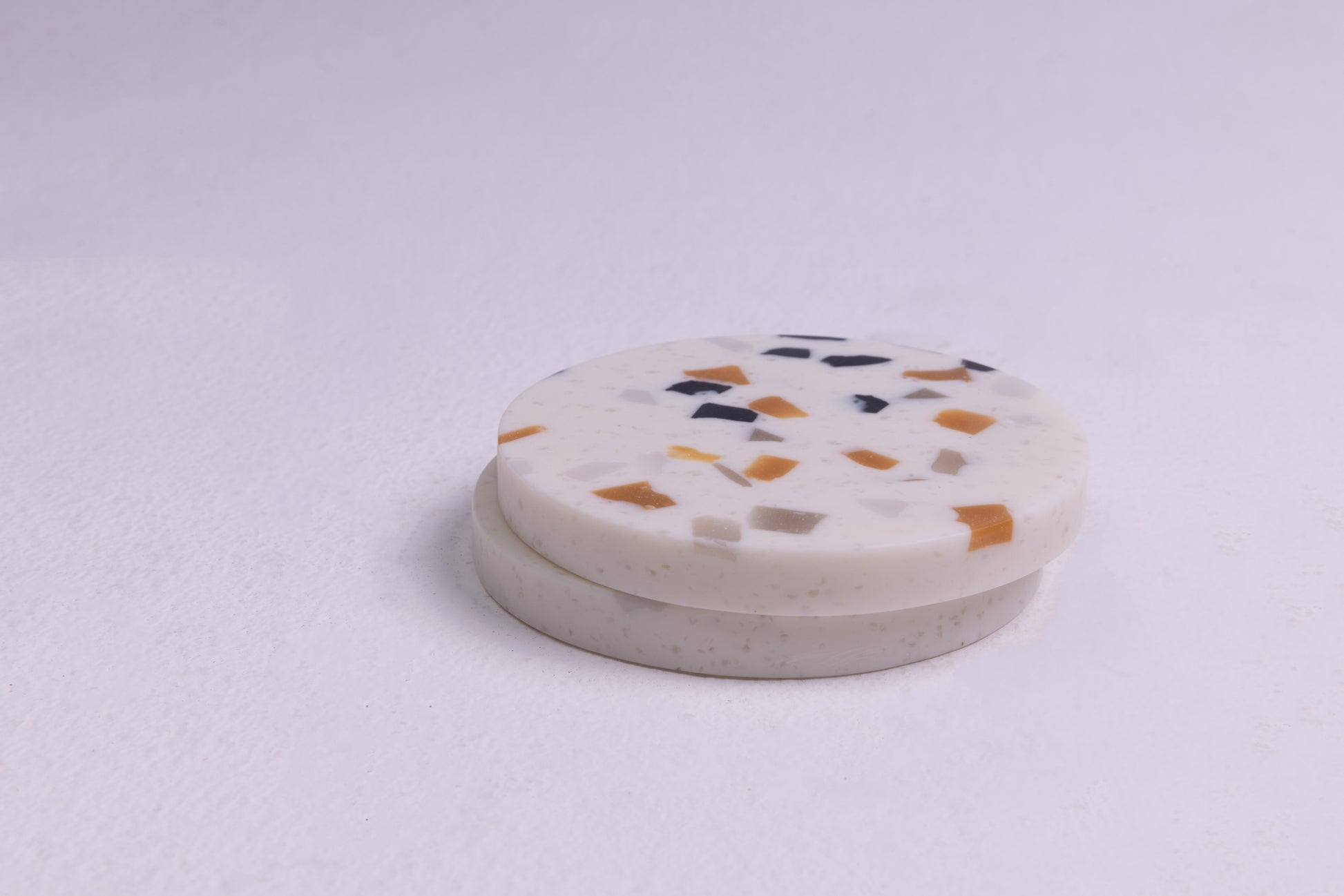 a set of earth tones coasters to complement your coffee tables