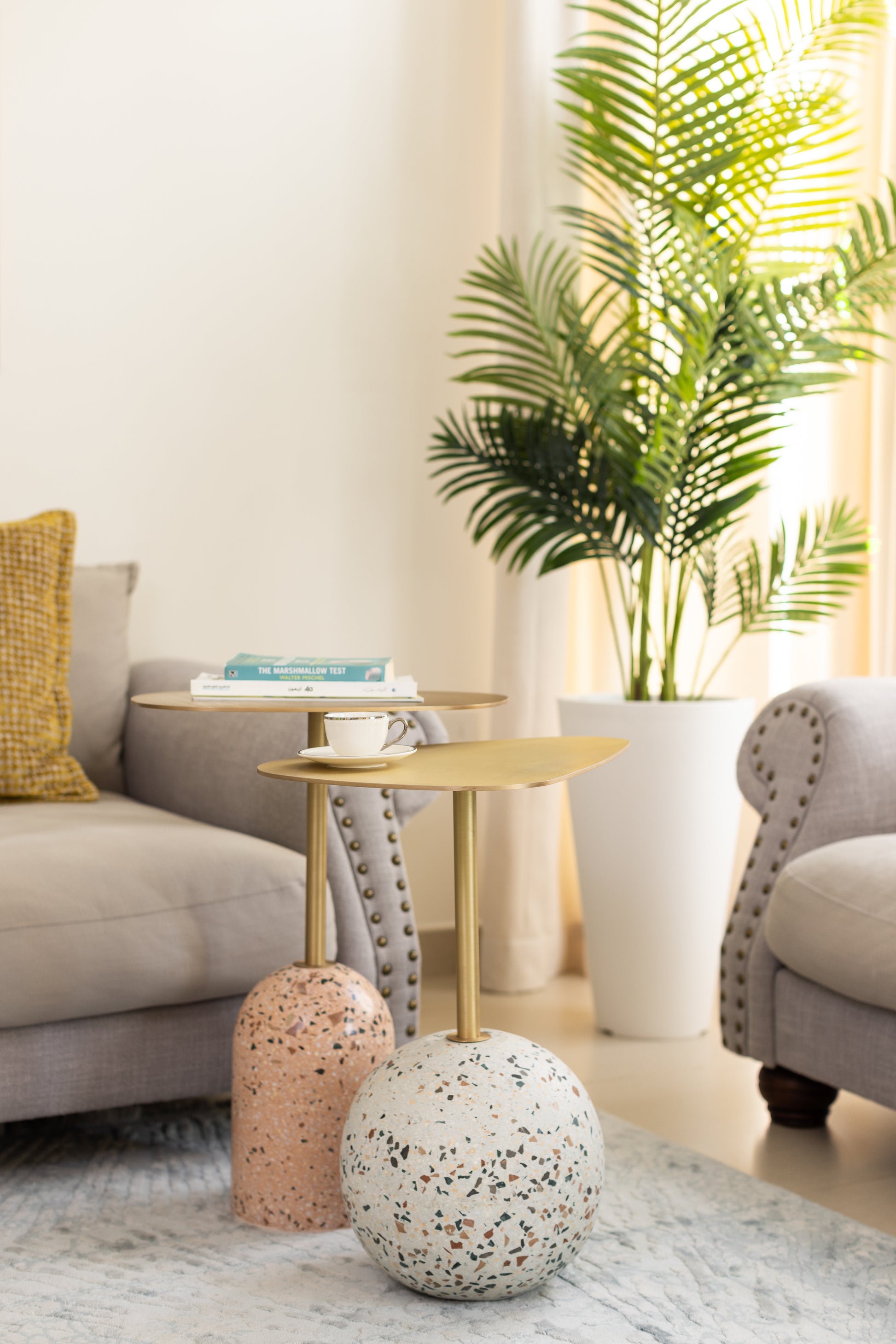 grey terrazzo ball and blush pink hemispherical terrazzo base for end tables