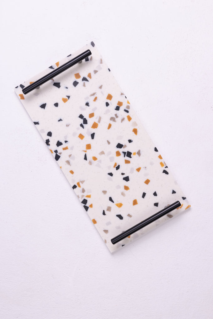 A serve ware coffee tray made from Corain material in terrazzo style